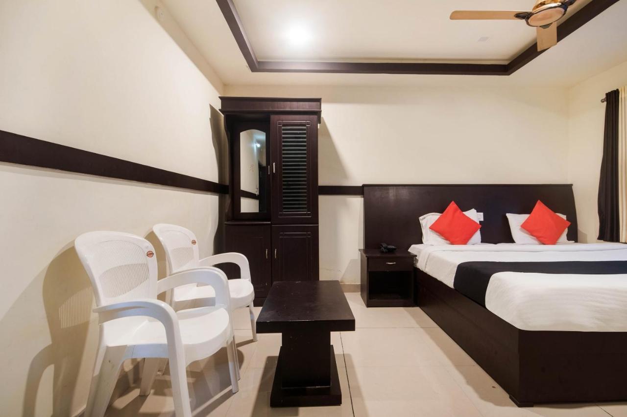 Capital O Alfa Hotel Vijayawāda Buitenkant foto